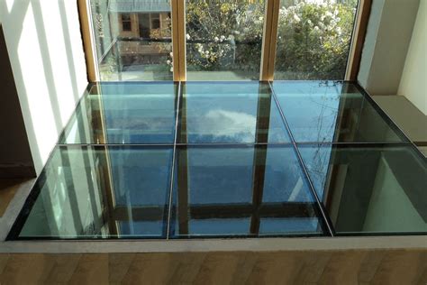 glass and metal perf house floor|Structural Glass Floors By GlassWalk™ .